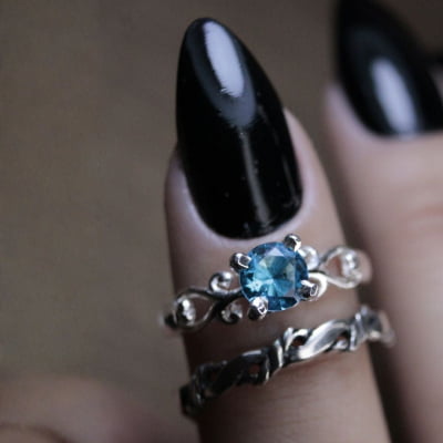 FRIGG – PAR DE ALIANÇAS (SOLITÁRIO + ANEL NORDIC ROPE) EM PRATA 925 COM ZIRCÔNIA AZUL CLARO